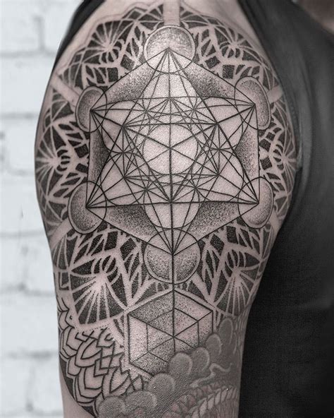 geometric shoulder tattoos for men.